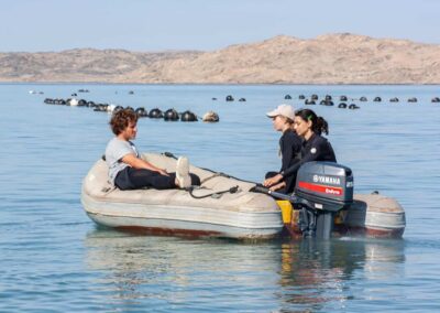 three interns in rescue boat