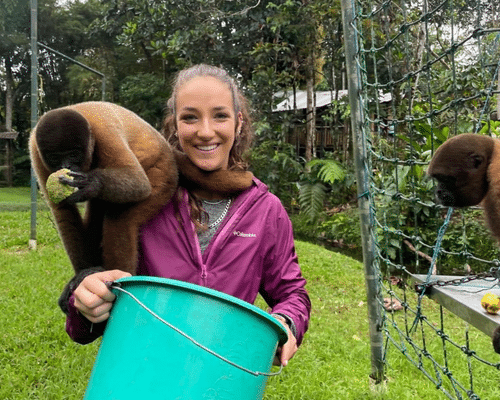 Carly with monkeys at wildlife rescue project in Ecuador