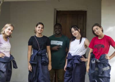 Four volunteers with staff member.